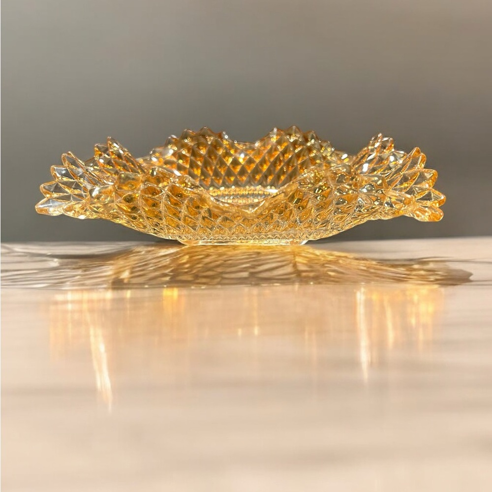 This vintage Federal Glass Amber Diamond Point Candy Dish